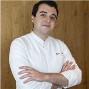 I would describe myself as a passionate and approachable professional with over a decade of experience in hospitality.